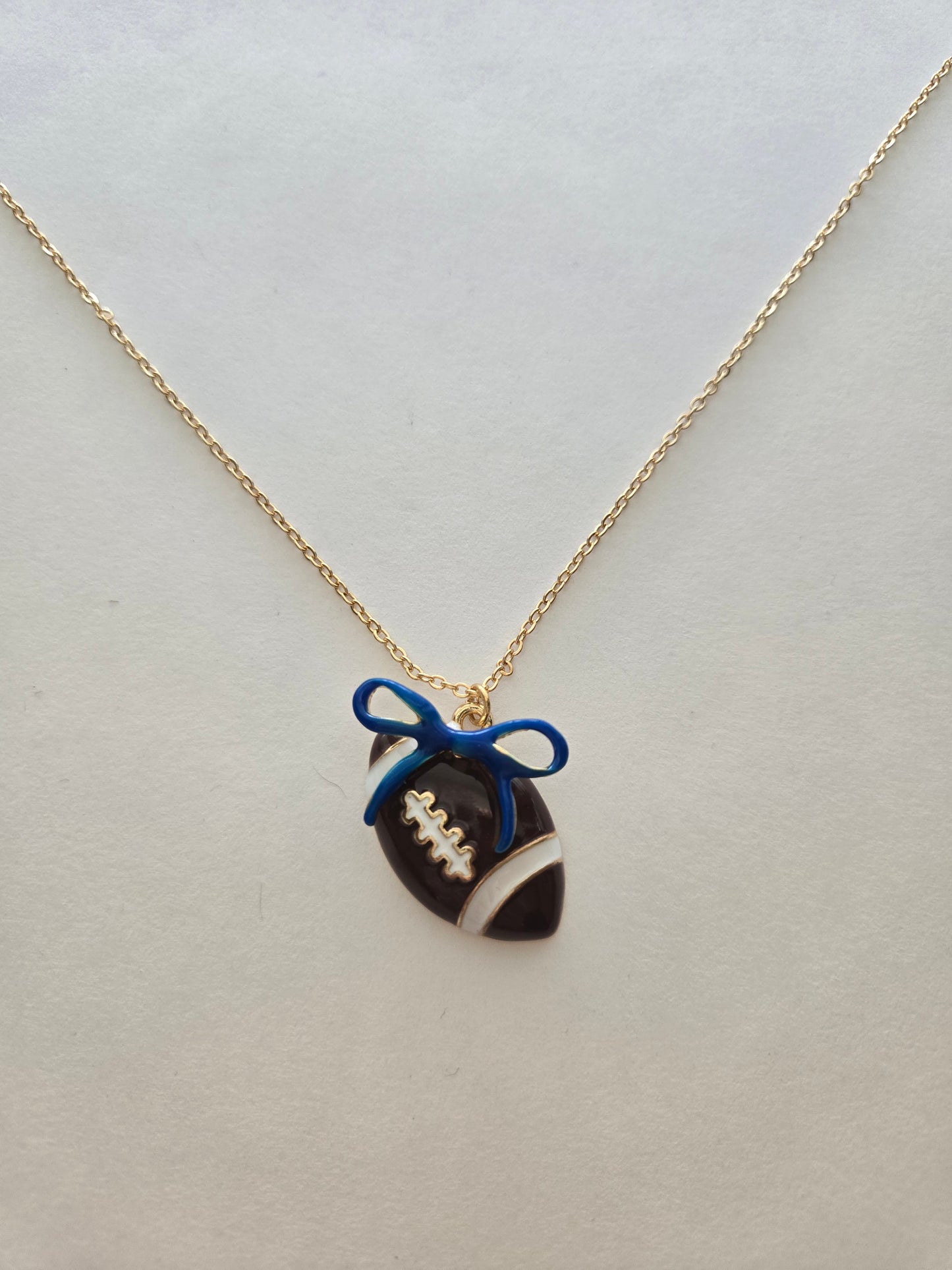 Football Necklace with Blue Bow Style # 1318