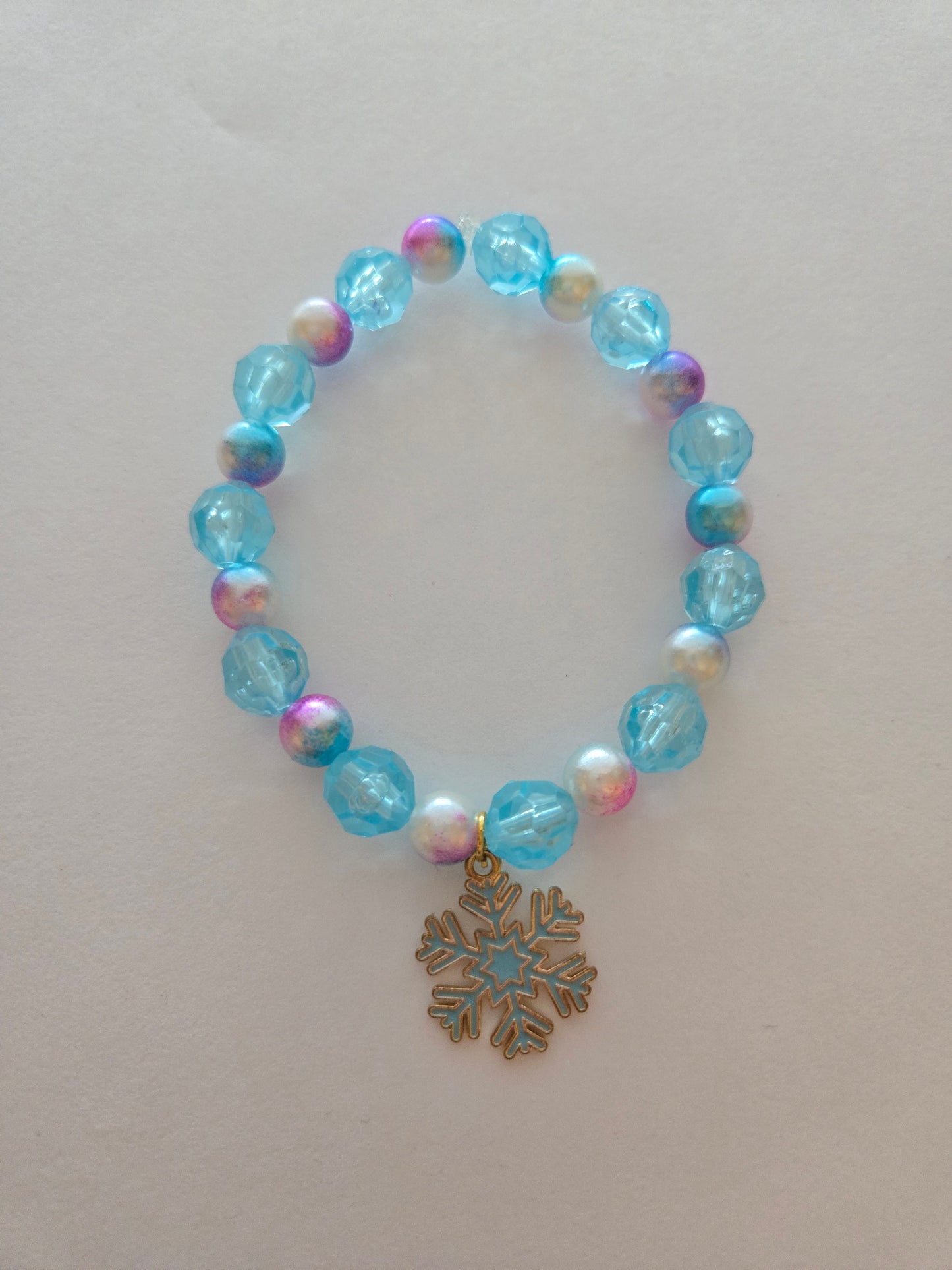 Blue with Multi-Colored Pearl and a Blue Snowflake Charm  Style # 416